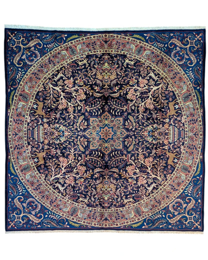Tappeto Kerman quadrato 261x264 cm, annodato a mano in lana e cotone con colori vegetali, fondo blu con dettagli floreali e medaglione centrale persiano.