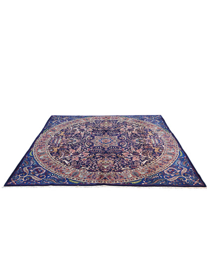 Tappeto Kerman quadrato 261x264 cm, annodato a mano in lana e cotone con colori vegetali, fondo blu con dettagli floreali e medaglione centrale persiano.