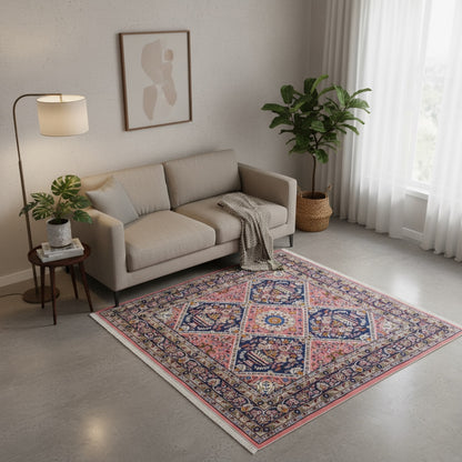 Tappeto Lilian con campo rosso mattone e motivi floreali stilizzati blu, annodato a mano in Persia con cotone e lana vegetale.