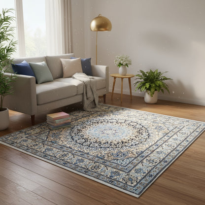 Tappeto Nain annodato a mano, medaglione floreale blu, avorio e nero. Trama in cotone, vello in lana e seta. Provenienza Persia, certificato di autenticità incluso.