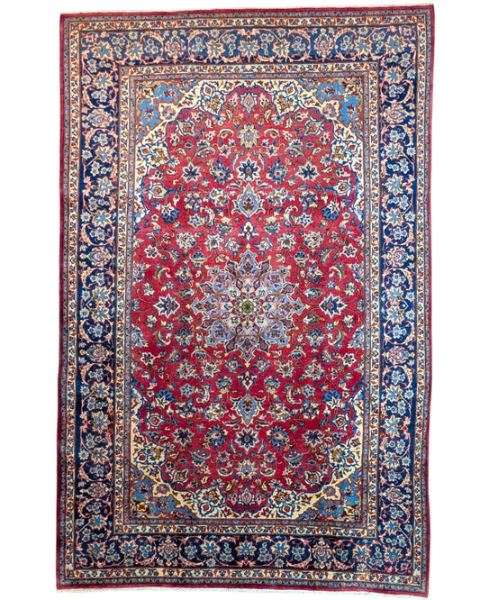 Tappeto Najafabad persiano 350x231 cm, annodato a mano in lana e cotone con colori vegetali, fondo rosso e dettagli blu e avorio.