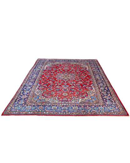 Tappeto Najafabad persiano 350x231 cm, annodato a mano in lana e cotone con colori vegetali, fondo rosso e dettagli blu e avorio.