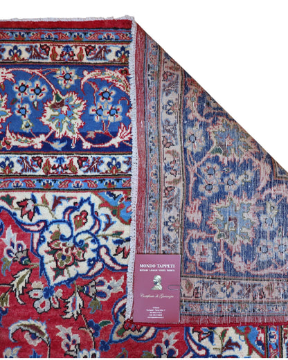 Tappeto Najafabad persiano 350x231 cm, annodato a mano in lana e cotone con colori vegetali, fondo rosso e dettagli blu e avorio.