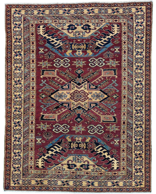 Tappeto Shirvan Afghan 163x127 cm annodato a mano, rettangolare, fondo rosso con motivi geometrici, realizzato in cotone e lana con colori vegetali.