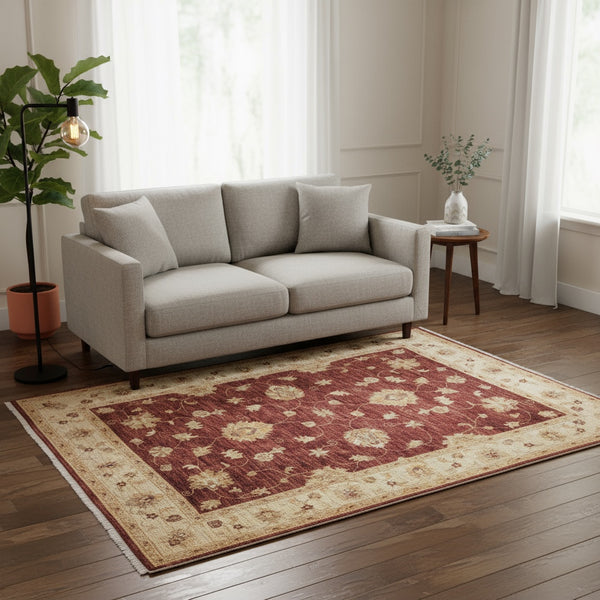 Tappeto Tabriz rosso con motivi floreali persiani, annodato a mano in Persia con lana e cotone tinti con colori vegetali.