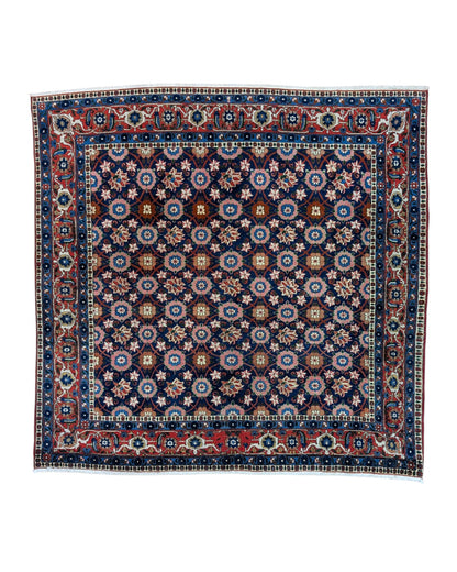 Tappeto Varamin 201x193 cm persiano annodato a mano, quasi quadrato, fondo blu con disegno floreale Mina Khani in rosa, avorio e azzurro, cornice rossa decorata.