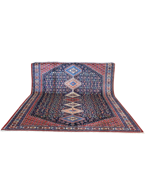 Tappeto Yalame persiano 346x265 cm, annodato a mano in lana e cotone, fondo blu con disegni geometrici tradizionali.