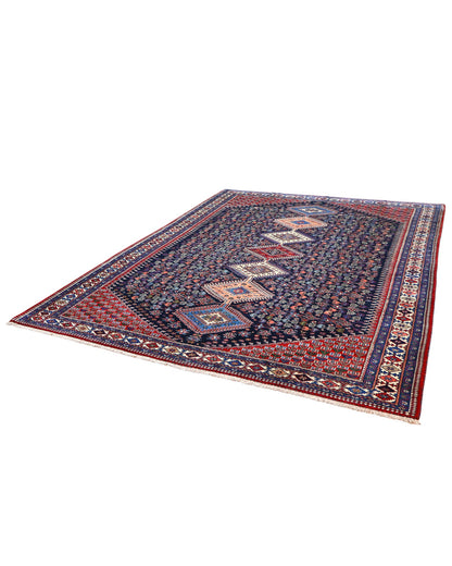 Tappeto Yalame persiano 346x265 cm, annodato a mano in lana e cotone, fondo blu con disegni geometrici tradizionali.