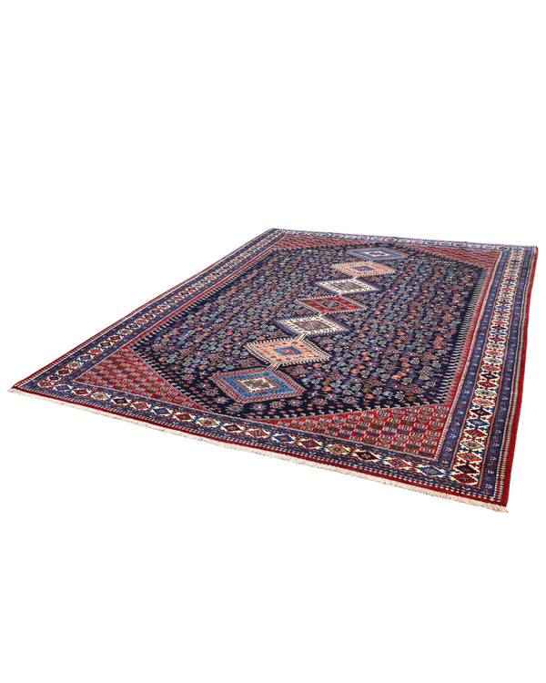 Tappeto Yalame persiano 346x265 cm, annodato a mano in lana e cotone, fondo blu con disegni geometrici tradizionali.