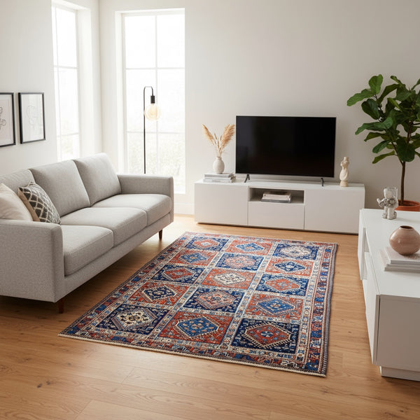 Tappeto Yalamhe persiano, fondo rosso mattone con motivi geometrici in blu, annodato a mano, 232x157 cm.