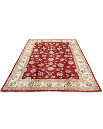 Tappeto Ziegler 298x207 cm con fondo bordeaux, motivi floreali avorio e dettagli azzurri, tramato ed annodato a mano, provenienza Afghanistan.