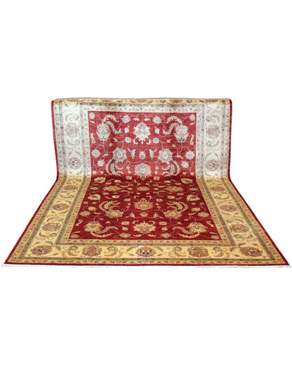 Tappeto Ziegler 307x215 cm con fondo bordeaux, motivi floreali avorio e dettagli verdi, tramato ed annodato a mano, provenienza Afghanistan.