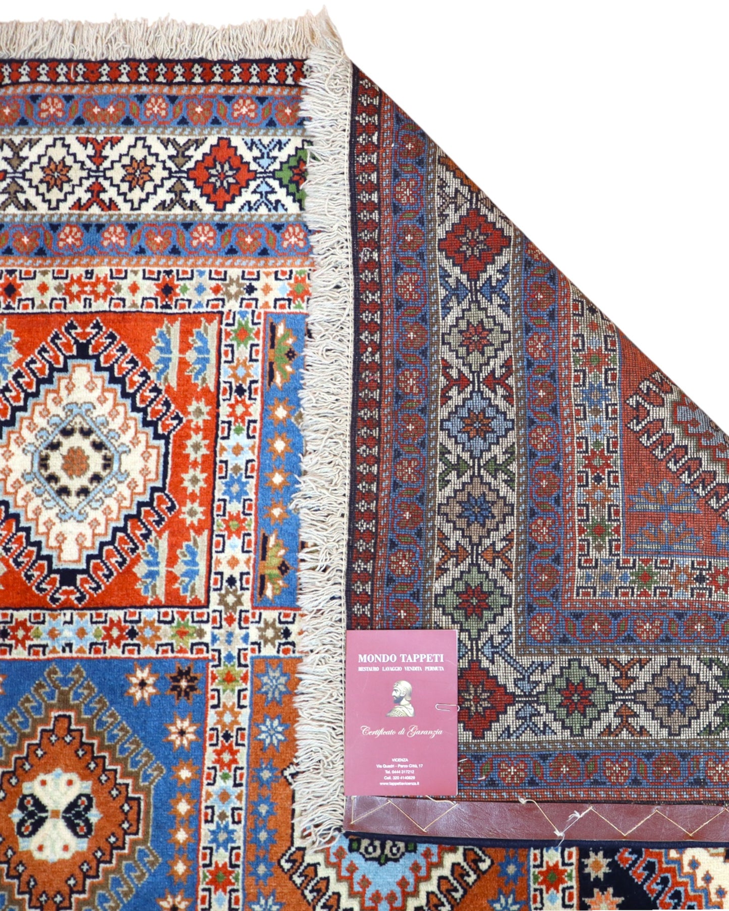 "Tappeto Yalameh annodato a mano con motivi geometrici in marrone, blu, rosso, giallo e crema, 290x204 cm."