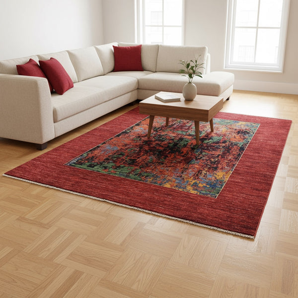 Tappeto moderno persiano “Estratto dei Colori” 237x182 cm, annodato a mano, lana e colori naturali, sfumature blu, verde, ocra e bordura rosso mattone.