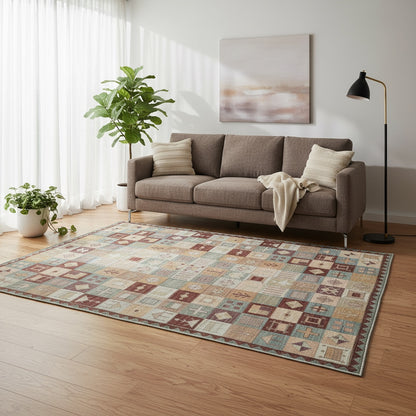 Tappeto persiano moderno con griglia di quadrati e rettangoli decorati, colori caldi e freddi armonizzati, annodato a mano in lana tinta vegetale con base in cotone.