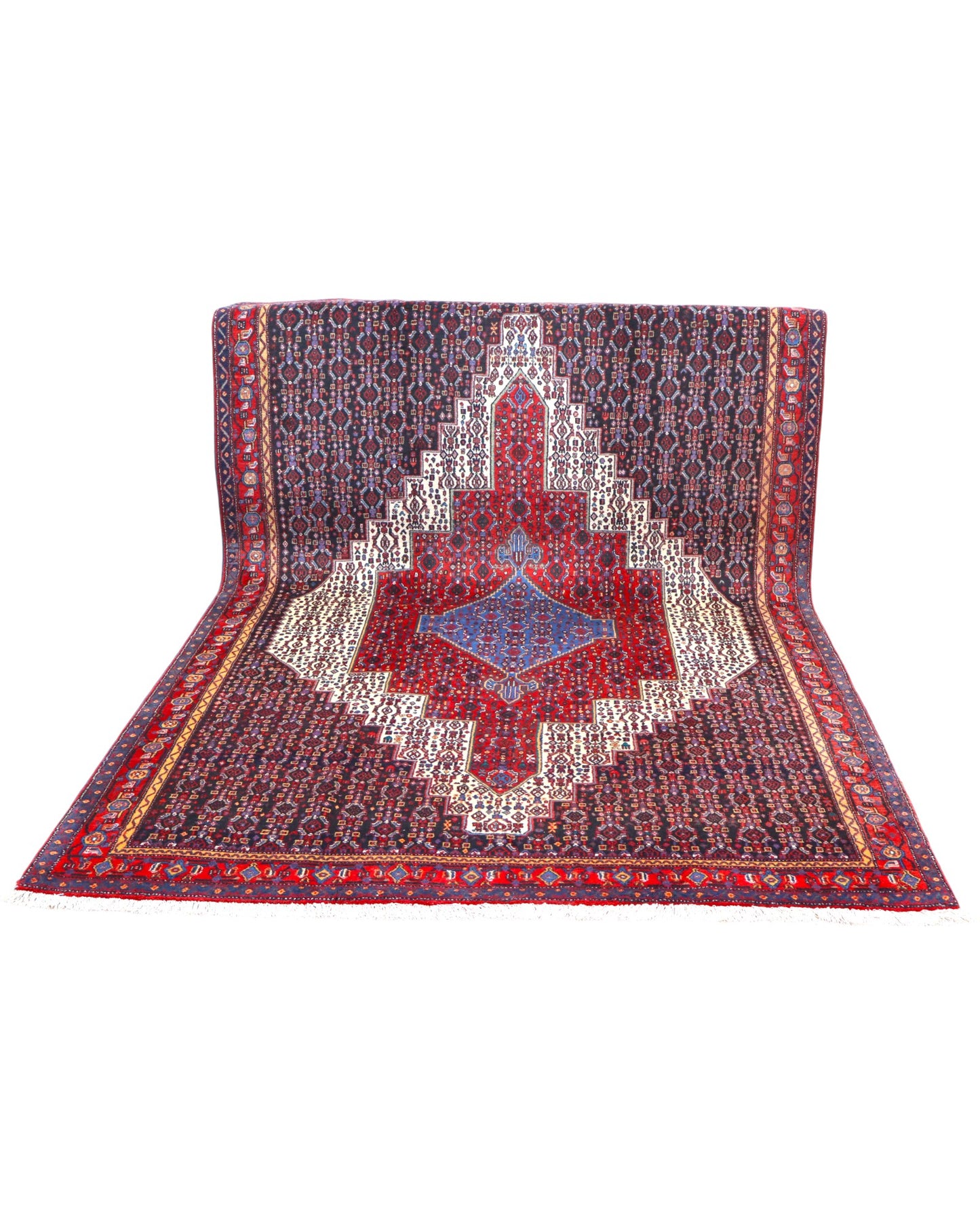 "Tappeto Sannhe annodato a mano con motivi geometrici e floreali in rosso, blu e bianco, 300x200 cm."