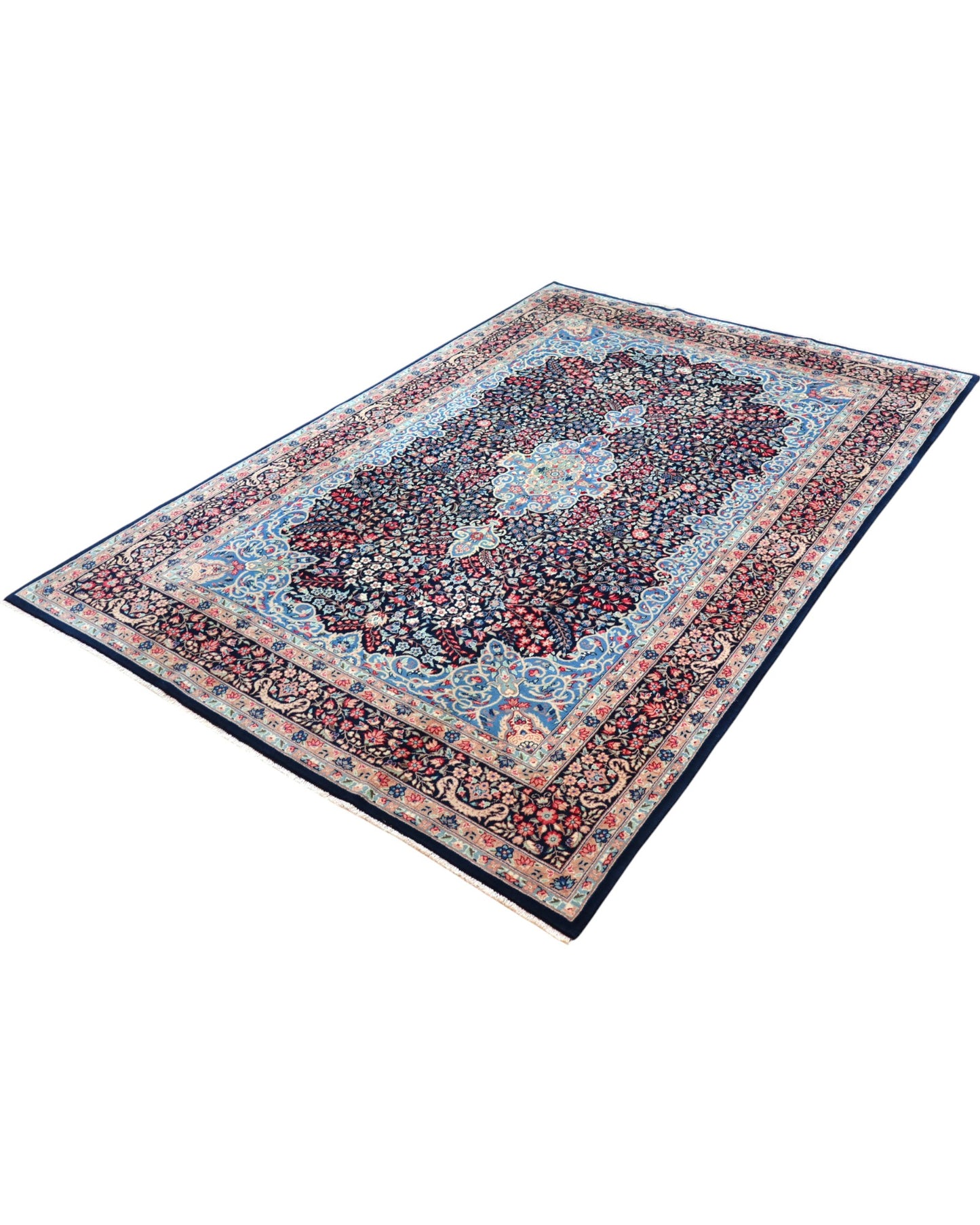 "Tappeto Kerman annodato a mano con motivi floreali in rosso, blu e avorio su fondo blu, 280x189 cm."