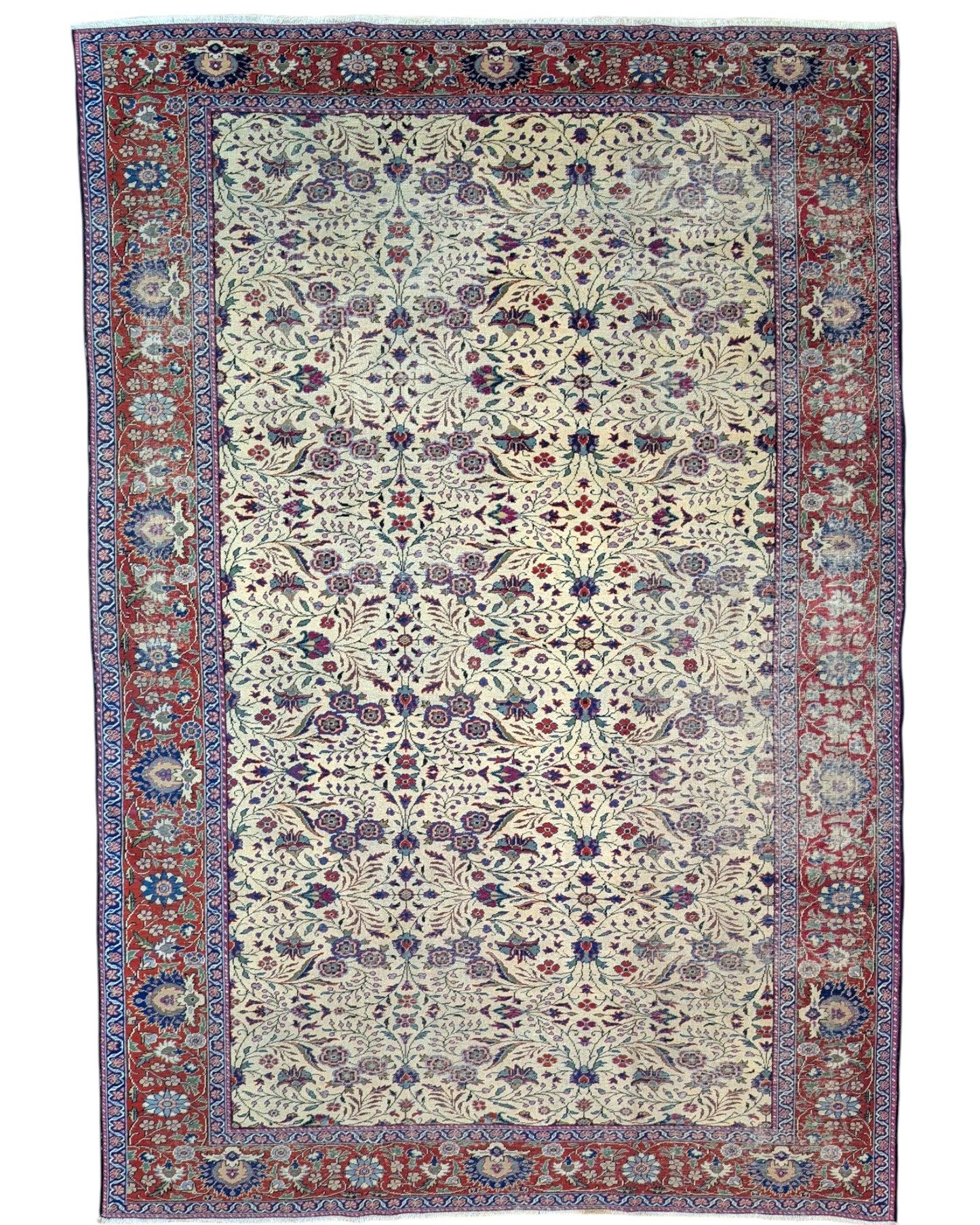 "Tappeto Turk annodato a mano con motivi floreali nei toni del blu, rosso e verde su fondo avorio, 294x201 cm."