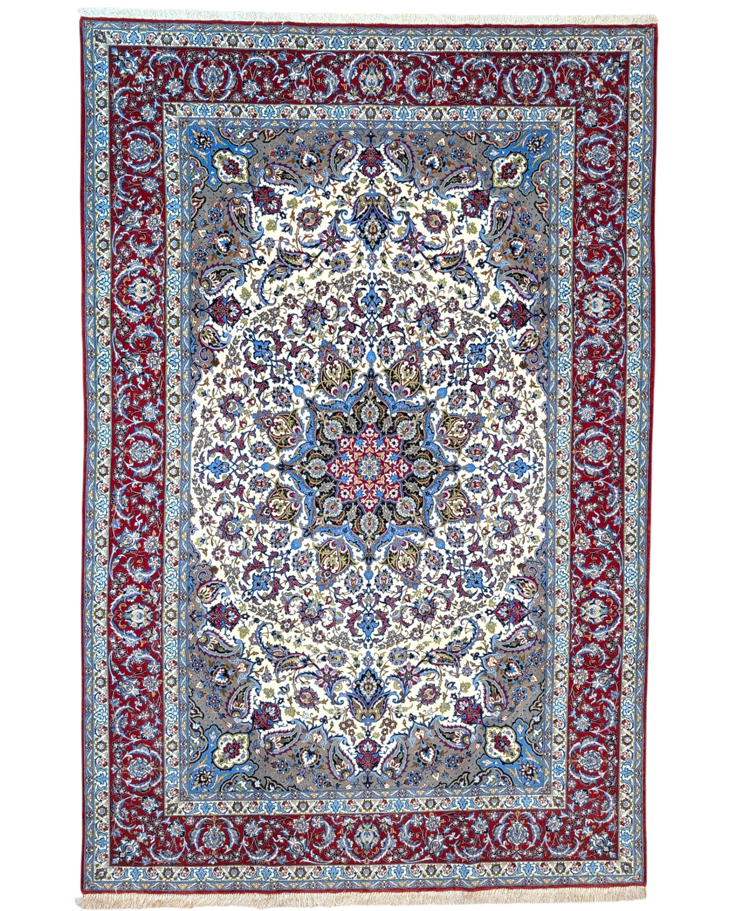 "Tappeto Esfahan annodato a mano con motivi floreali in blu, rosso, oro e marrone su fondo avorio, 306x203 cm."