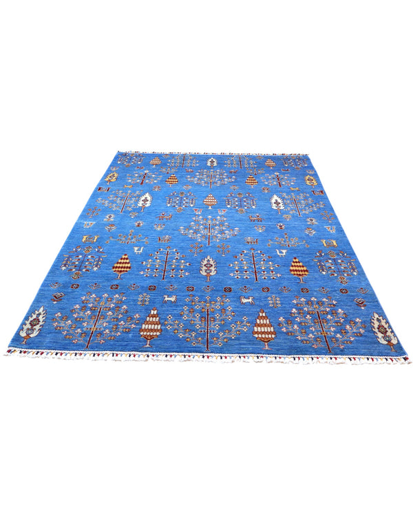 "Tappeto moderno blu con motivi Gabbeh stilizzati in oro, crema e rosso, annodato a mano, 300x200 cm."