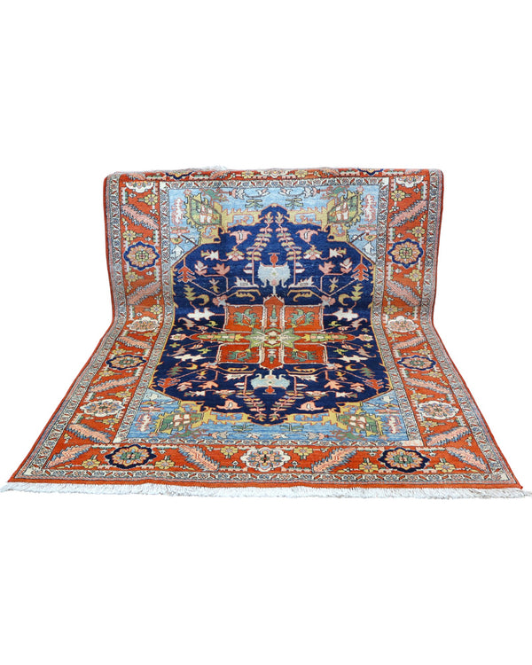 "Tappeto Heriz persiano blu e terracotta con medaglione geometrico, 290x205 cm."