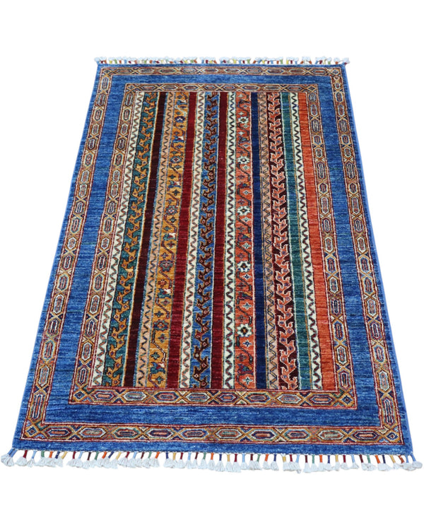 Tappeto Shirvan caucasico 155x95 cm annodato a mano, fondo blu con righe verticali multicolore e motivi geometrici tradizionali
