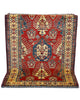 Tappeto Kazak rosso con cornice beige e motivi geometrici, annodato a mano in Afghanistan in lana e cotone con colori vegetali.