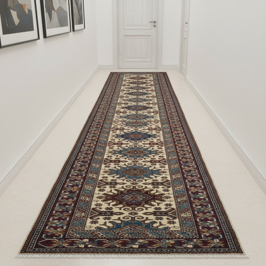 Tappeto Shirvan annodato a mano 301x83 cm in lana con fondo beige, cornice rossa e motivi geometrici tradizionali afgani.