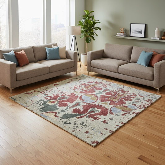 Tappeto Moderno persiano 270x184 cm con fondo verde chiaro e motivi ikat in rosso, blu e verde scuro, tramato ed annodato a mano.