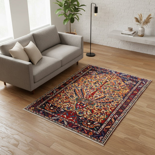 Tappeto 204x151 cm arancio rame e blu con motivo floreale per soggiorno elegante.