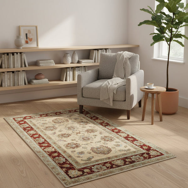 Tappeto Ziegler 184x116 cm con fondo avorio e bordura bordeaux, motivi floreali eleganti, tramato ed annodato a mano, provenienza Afghanistan.