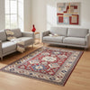 Tappeto Kazak 330x224 cm con fondo rosso, medaglione centrale avorio e motivi geometrici blu e azzurri, tramato ed annodato a mano, provenienza Caucaso.