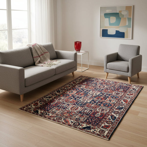 "Tappeto Bahtiyari annodato a mano con motivi geometrici e floreali in bianco, rosso, blu e marrone, 305x209 cm."