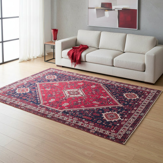 Tappeto Shiraz 310x215 cm, fondo rosso intenso con grande medaglione geometrico, dettagli blu scuro e avorio, annodato a mano, certificato incluso.