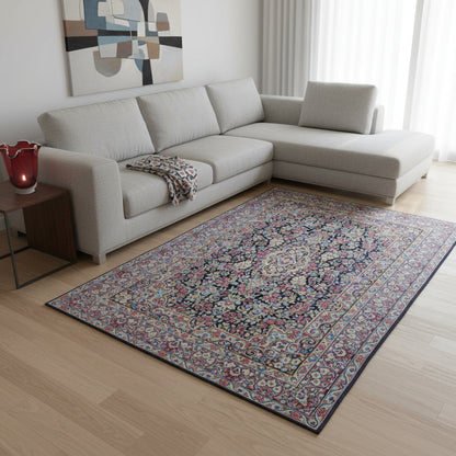Tappeto Kerman 296x197 cm con fondo blu notte e motivi floreali rosa, avorio e verde, tramato ed annodato a mano, provenienza Kerman.