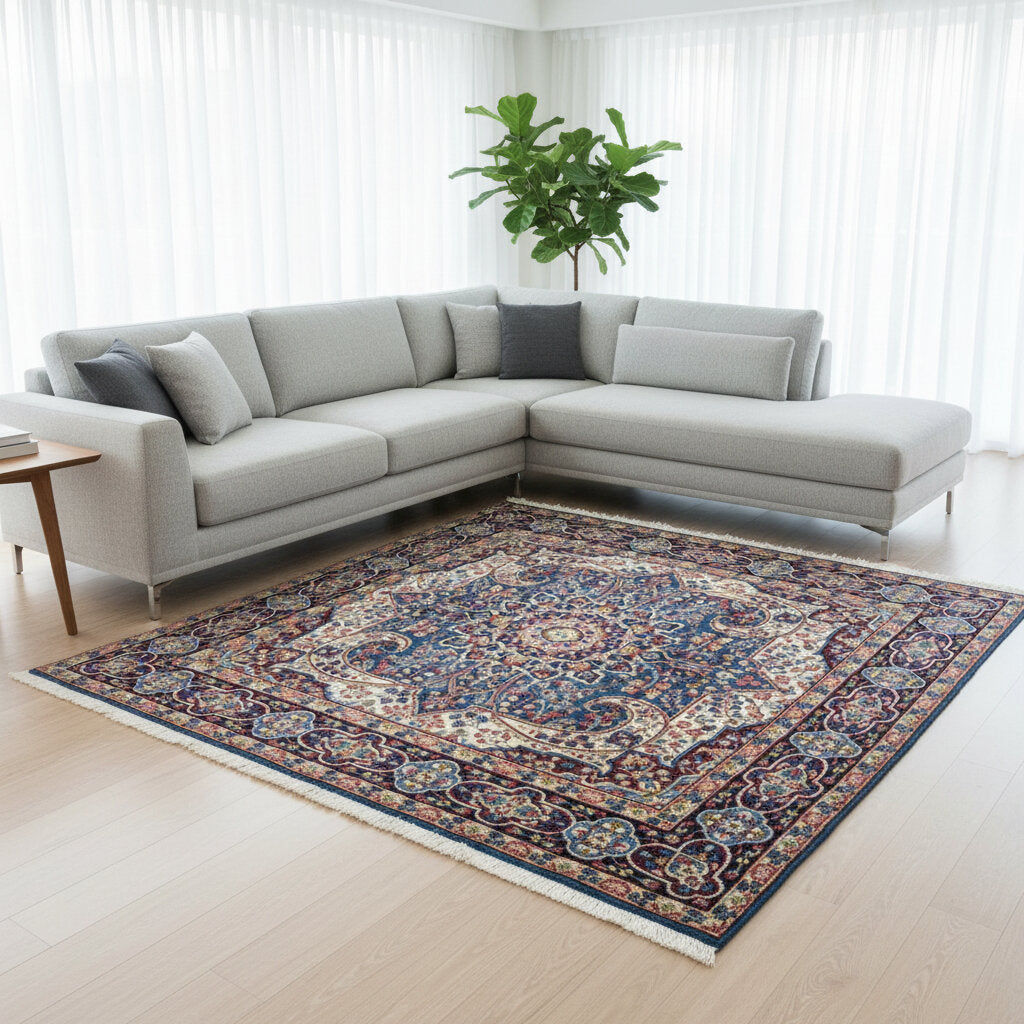 Tappeto Kirman 200x200 cm con motivo floreale centrale in blu, rosso e oro, bordura decorata, annodato a mano con lana pregiata e ordito in cotone.