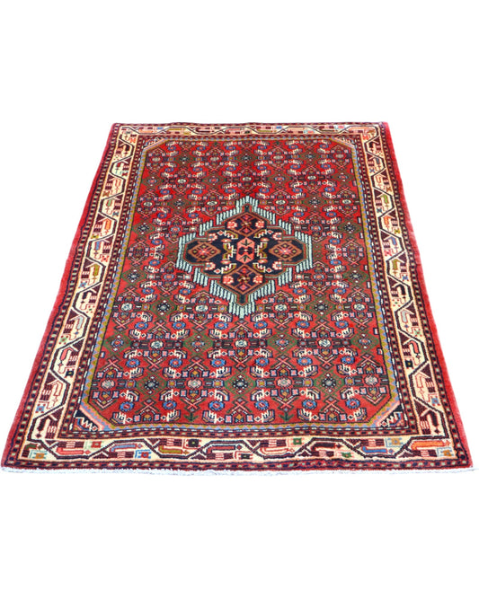 Tappeto Hamedan rosso 150x105 cm con disegno tradizionale in salotto