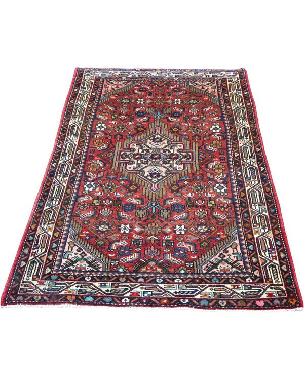 Tappeto Hamedan rosso 174x112 cm con disegno tradizionale in salotto