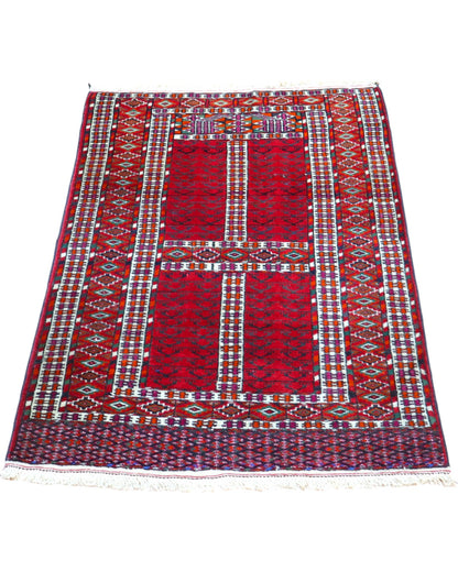 Tappeto tribale rosso 130x90 cm con disegni Bokhara in ingresso