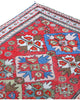 Tappeto caucaso geometrico rosso 166x110 cm in camera da letto