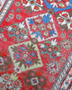 Tappeto rosso antico con dettagli blu 166x110 cm per soggiorno