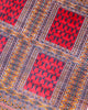 Tappeto Bokhara geometrico rosso 108x119 cm in camera da letto