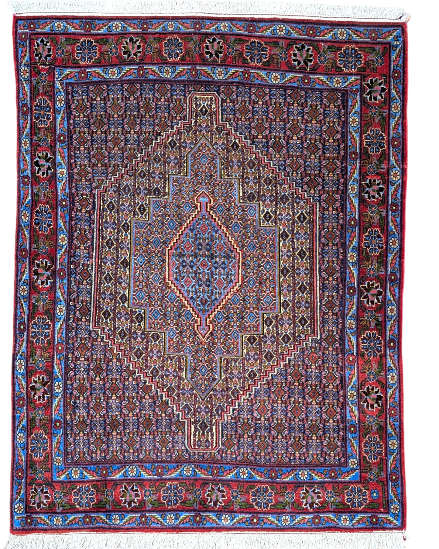 Tappeto Sanneh multicolore 163x123 cm con disegno geometrico in salotto