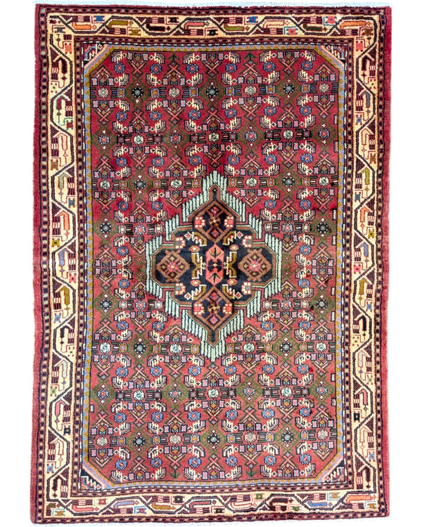 Tappeto persiano 150x105 cm rosso con medaglione geometrico in soggiorno elegante