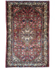 Tappeto persiano 174x112 cm rosso con medaglione geometrico in soggiorno elegante