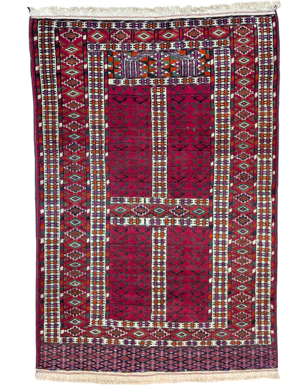 Tappeto Bokhara 130x90 cm rosso con motivi geometrici in soggiorno elegante