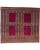 Tappeto Bokhara 108x119 cm rosso con motivi geometrici in soggiorno elegante