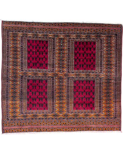 Tappeto Bokhara 108x119 cm rosso con motivi geometrici in soggiorno elegante