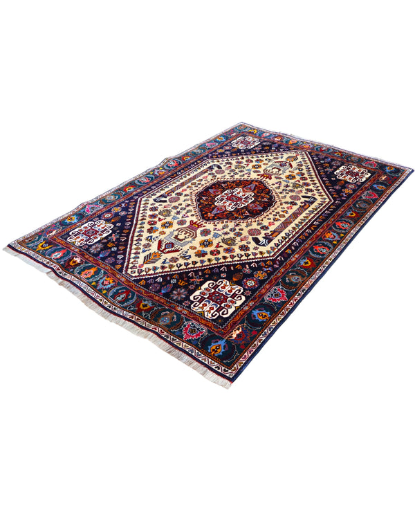 Tappeto in lana 239x160 cm avorio e blu con disegno geometrico per ambiente orientale.