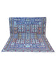 Tappeto 270x200 cm azzurro e blu in soggiorno elegante con disegno geometrico floreale.